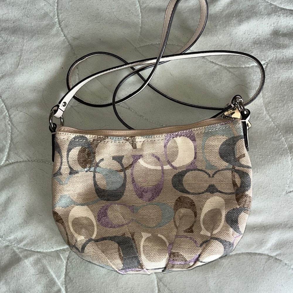 Beige Coach crossbody purse